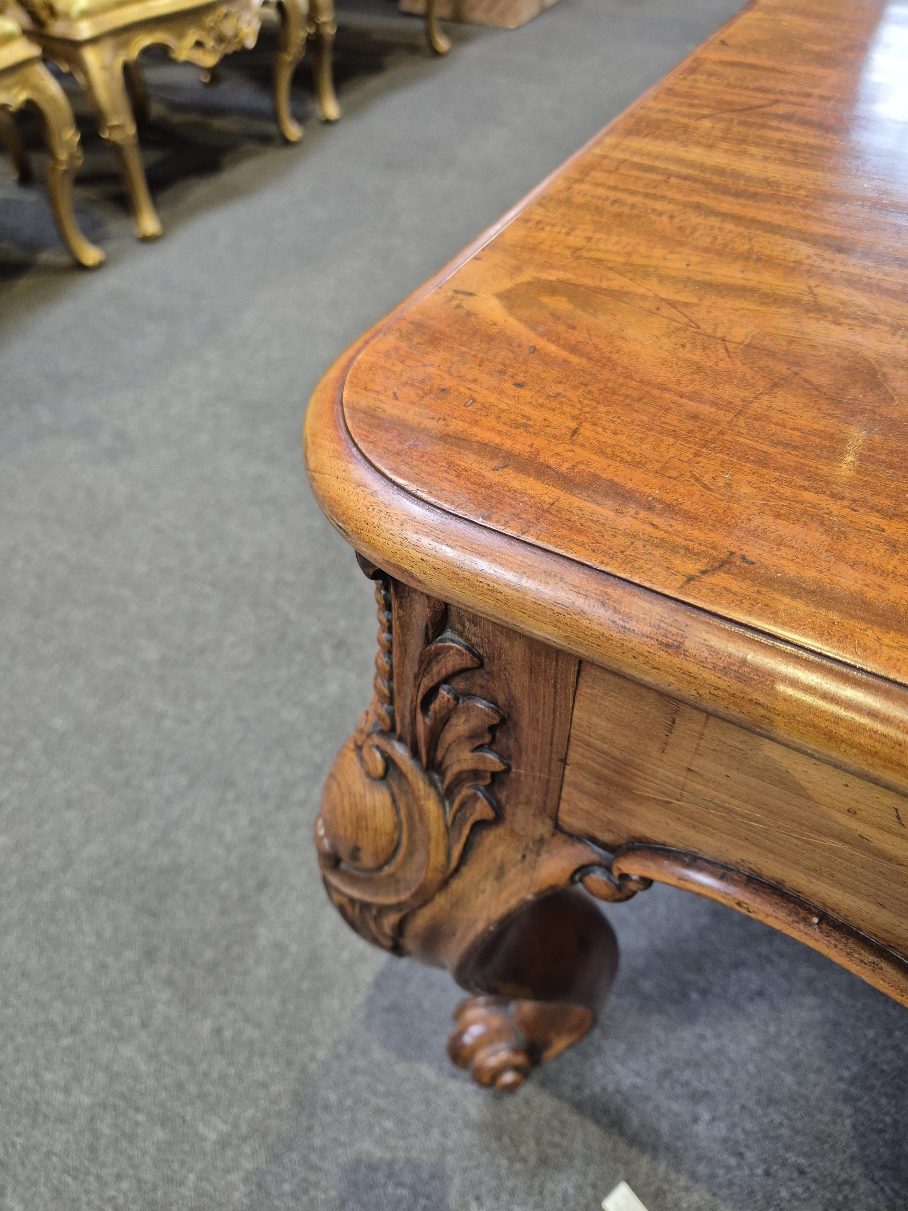 An unusually large William IV mahogany extending dining table